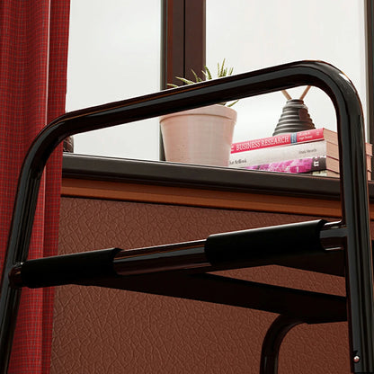 Black elastic sex chair with dual straps and square armrests.